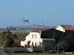 Llobregat delta farmhouse, terminal T1 and plane landing