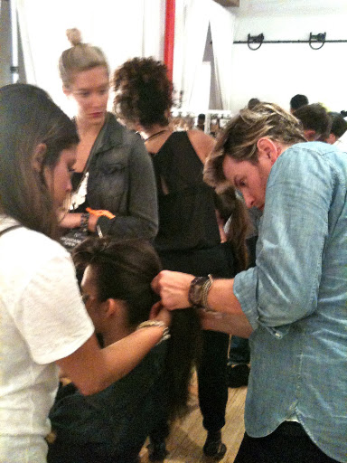 Tommy Buckett, a stylist at Marie Robinson Salon in NYC, worked with Garnier products like the new Sleek & Shine 5-in-1 Serum Spray to slick back models' strands into a '50s Barbie-inspired ponytail.