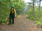 Jenni is lead pulling head fire-Laura follows back firing off the road.