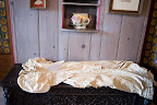 Evan's great great grandmother's wedding gown and shoes were on display inside the house. Evan's great great grandmother's wedding gown and shoes were on display inside the house.
