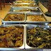 A long table of meat dishes in Nanay Bebeng Restaurant
