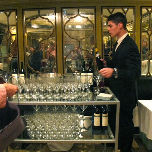 Mirrored walls in BG, the seventh-floor restaurant at Bergdorf Goodman, kept the space bright and glittery even in the evening. Drinks flowed in celebratory style.