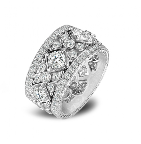 Looking for a wedding band you can wear on it's own? Jack Kelege platinum and diamond style features with ornate filigree work and hand-engraving.