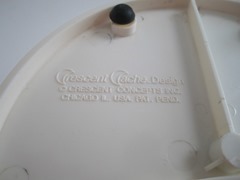 Crescent shaped, plastic swivel drawer box