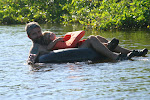 Inner tubing in the river Caraiva, Brazil