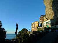 Brilliant blue sky and the moon over Amalfi as we depart in the early morning.