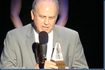 Pete Wernick accepting the Guitar Player of the Year Award for Bryan Sutton, 2011