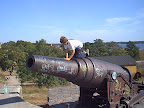 Child climbing on cannon