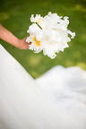 Cattleya orchids, available year-round, have fluttery petals and a buttery center that adds romance and brightness to any bunch.  
Photo by Gruber Photographers.
