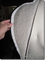 The pad stitched lapel on the dress form.
