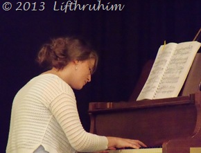 Boobear plays the piano during the recital