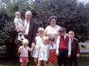 c0 Thomas G Cairns (upper left) and grandchildren c. 1972; that's me, looking down at my little sister, Linda