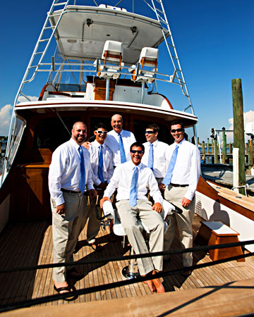 Brad and his groomsmen wore Jos. A. Bank suits and flip flops for his seaside wedding in Florida. They relaxed on a boat in the Destin harbor before the wedding. Brad and his groomsmen wore Jos. A. Bank suits and flip flops for his seaside wedding in Florida. They relaxed on a boat in the Destin harbor before the wedding.