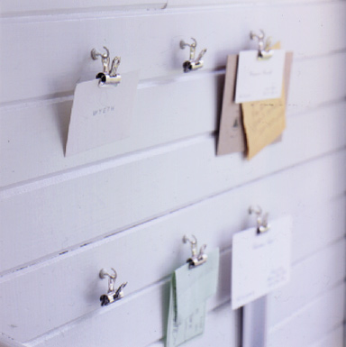 Screw hooks and clips are an easy way to keep important papers visible.