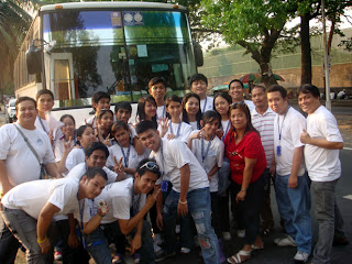 March 25: Students pose in front of Histoury Tours Company Bus together with company officials.