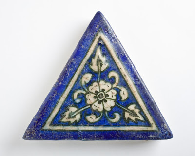 Tile | Origin: Iran, Tabriz | Period: 1465/870 A.H. | Collection: The Madina Collection of Islamic Art, gift of Camilla Chandler Frost (M.2002.1.304) | Type: Ceramic; Architectural element, Fritware, molded and underglaze-painted, 5 1/4 x 5 3/4 in. (13.33 x 14.60 cm)