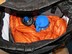 Hooded puffy jacket.