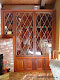 Custom copper diamond cabinets with mouth blown glass and antiqued brass frames for a private home in Santa Cruz, CA.