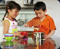 Two children making pudding-305463