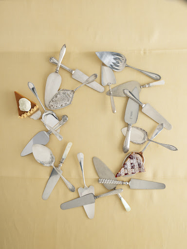 The spade-shaped silver-plate server, far right, was made by Tiffany in the 1880s. Because of its desirable name, the piece can fetch a few hundred dollars (others pictured here go for far less).