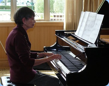 Colleen Kerr playing the grand piano. Photo courtesy of Dennis Lyons.