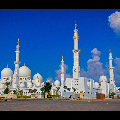 We went to Abu Dhabi for three reasons:1. To say we went to Abu Dhabi.2. It was cheaper to fly into AUH than DXB (Dubai).3. To see Sheikh Zayed Mosque.(I put in two of those reasons because I felt bad for really only having one reason to visit Abu Dhabi.)But let me tell you, that third reason?Amazing.The Sheikh Zayed Mosque is hands down the best mosque I've ever seen.I've always wanted to visit the Badshahi Mosque in Lahore, but why do I need to anymore when I visited a pearl white one sitting in the UAE with the world's largest chandelier and the world's largest carpet?The mosque truly was amazing. Shining so bright in the Emirati sun that you have to squint while standing in the magnificent courtyard just to see anything.Many things associated with it are highly unnecesssary... but I guess that's in line with the Emirati culture... bad dum pum.But it truly was jaw-dropping.There were a few annoying rules though.No photos before Juma.Every female has to we 5194433029.jpg