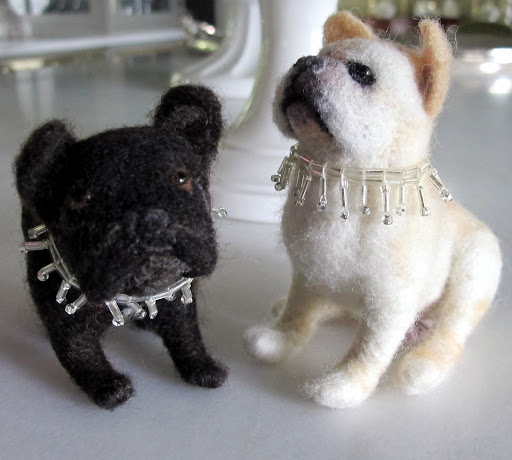 Martha recently did a whole show on Etsy and featured many designers.  These adorable needle felted likenesses were made by Jennifer Thornington, who sells on Etsy.
http://www.marthastewart.com/901112/etsy-show