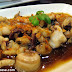 Pla Mug Kratiem (squid with garlic, pepper and cilantro) at Bangkok Wok