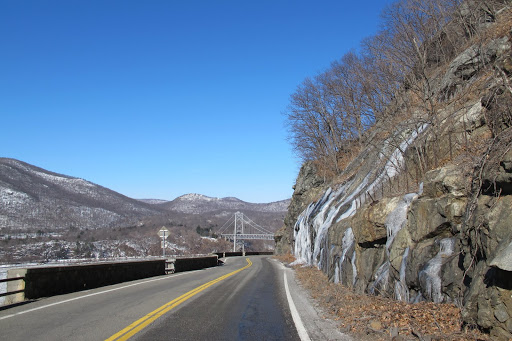 Hey, Sharkey and G.K.! - There's the Bear Mountain Bridge up ahead!  It crosses over the mighty Hudson River and leads right to Bear Mountain State Park.