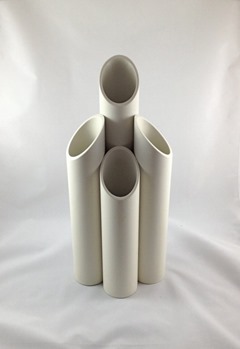Tubular white plastic mod vase with four openings