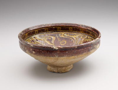 Bowl | Origin:  Iran | Period: 12th-13th century | Details:  Not Available | Type: Earthenware with decoration carved through a white slip and coloring under a transparent glaze | Size: H: 10.3  W: 21.9  cm | Museum Code: F1925.9 | Photograph and description taken from Freer and the Sackler (Smithsonian) Museums.