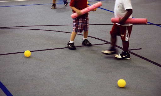 Children play in the gymnasium at Grow to Know Preschool & Kindergarten.
(Photo Credit: Alex Crowder)