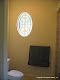 Leaded, with colored glass in bath window.