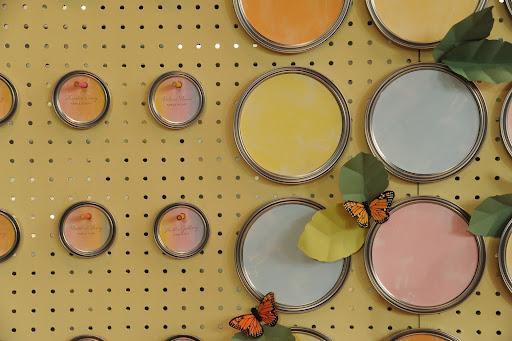 Bryan's seating card idea with paint can lids.