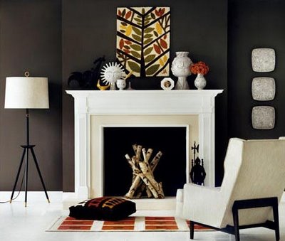 An orange-tiled rug and bone-white wall hangings add subtle seasonal spook. (www.decorpad.com) An orange-tiled rug and bone-white wall hangings add subtle seasonal spook. (www.decorpad.com)