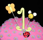 Hugs and stitches first birthday cake
