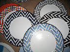 Some Mikasa Color Studio plates in orange, navy, blue, brown, and grey. We loved the geometric pattern.