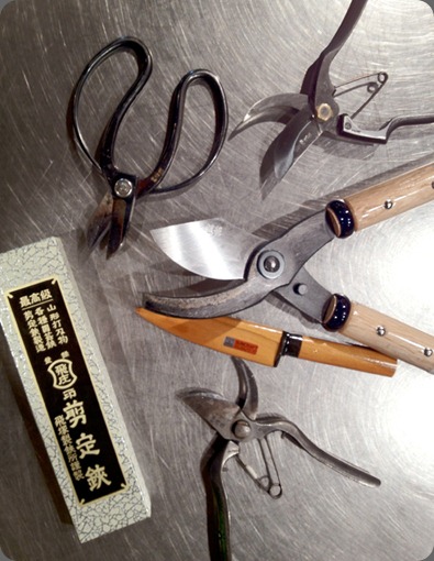 japanese floral tools on a stainless steel table