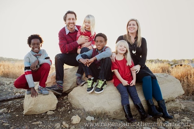 family sitting on rocks best (Medium)