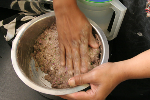 Add water and mix until the dough is not too wet or dry.