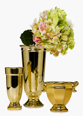 Shiny gold ceramic vases.