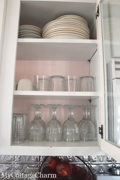 how to organize cabinets with glass doors