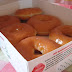 Glossy, fluffy Krispy Kreme doughnuts