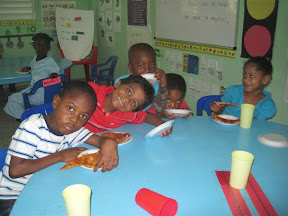 Willy, Wandy, Isaac, Andy and Paola are excited about pizza!