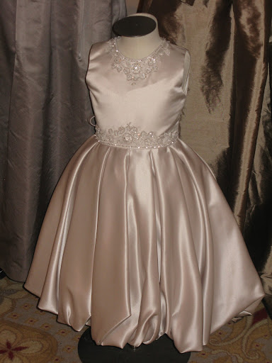 Isn't this flower girl dress from Joan Calabrese beautiful?
