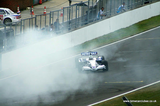 Andy Priaulx demonstrates the BMW Sauber Team F1 racing car.