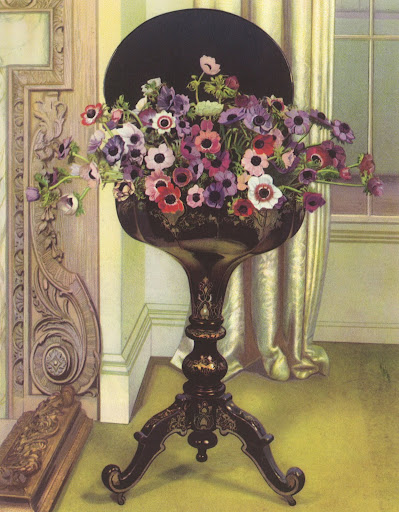 Here, colorful anemones are set inside a beautiful papier mache work-table.  When this photograph was taken, the anemones were surprisingly a fortnight old and still blooming strong as ever.