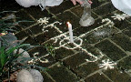 A wedding veve (religious Voodoo symbol) made with powder. A wedding veve (religious Voodoo symbol) made with powder.