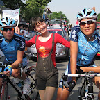 Leon van Bon and Loh Sea Keong with a Chinese cycling fan. (photo: Remko Kramer)