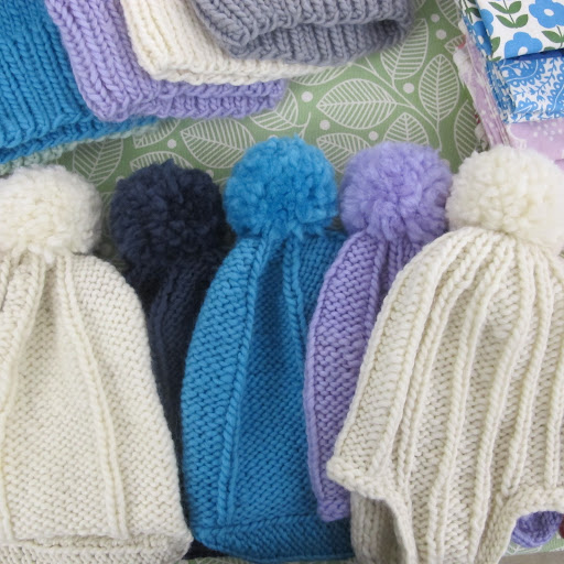 These hats were made using our new Lion Brand yarn.